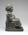 Statue of Gudea, named “Gudea, the man who built the temple, may his life be long”, Diorite, Neo-Sumerian