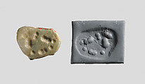 Seal amulet in the form of a reclining cow, Onyx