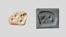 Seal amulet in the form of a recumbent bovid, Stone, cream colored