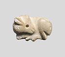 Seal amulet in the form of a reclining cow, Stone