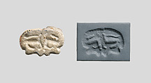 Seal amulet in the form of a reclining cow, Stone