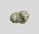 Seal amulet in the form of a recumbent bovid, Calcite, green