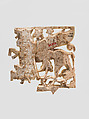 Openwork plaque with a sphinx striding through a floral landscape, Ivory, Assyrian