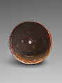 Beaker with bronze pin in base, Jasper conglomerate, bronze, Iran