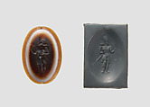 Stamp seal: standing noble holding a flower, Sardonyx, Sasanian