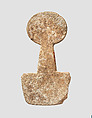 Spade-shaped schematic female (?) figure, Limestone