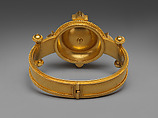 Hinged bracelet with Assyrian human-headed winged bull medallion, Gold , British