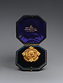 Brooch with Assyrian human-headed winged bull, Gold, glass, British