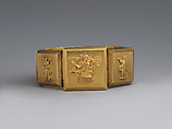Hinged bracelet with Assyrian-inspired decoration, Gold, British