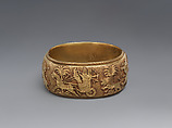 Bracelet with Assyrian-inspired design, Gold, British