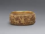 Bracelet with Assyrian-inspired design, Gold, British