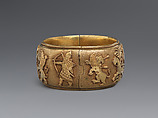 Bracelet with Assyrian-inspired design, Gold, British