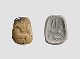 Stamp seal (octagonal pyramid, worn) with divine symbols, Feldspar (?), yellow black, Assyrian