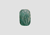 Stamp seal (octagonal pyramid) with divine being, Blue-green Glass, Assyro-Babylonian