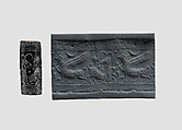 Cylinder seal (with pin preserved) with animal-monster contest scene, Black Steatite, with copper/bronze pin, Assyrian