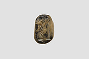 Stamp seal (octagonal pyramid, worn) with cultic scene, Feldspar, yellow black, Assyrian