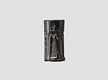 Cylinder seal and modern impression: suppliant goddess and offering bearer approaching Ishtar, three columns of inscription, Hematite, Babylonian