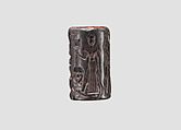 Cylinder seal and modern impression: heroes and animals in combat, head of the monster Humbaba, Hematite, Babylonian