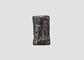 Cylinder seal and modern impression: heroes and animals in combat, head of the monster Humbaba, Hematite, Babylonian