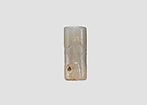 Cylinder seal and modern impression: hero grasping two antelopes by their hind legs, Chalcedony, Assyrian