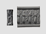 Cylinder seal and modern impression: animal-headed divinities with prey, Hematite, Cypriot