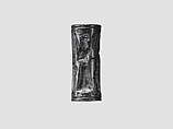 Cylinder seal and modern impression: animal-headed divinities with prey, Hematite, Cypriot