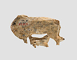 Openwork furniture plaque with a cow suckling a calf, Ivory, Assyrian