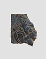 Furniture plaque carved in relief with man holding vessel to his mouth, Ivory, Iran