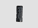 Cylinder seal and modern impression: female figure, ibex, lion, Black-grey hematite, Cypriot