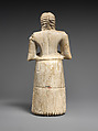 Standing male worshiper, Gypsum alabaster, shell, black limestone, bitumen, Sumerian