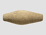 Cuneiform cylinder with inscription of Nebuchadnezzar II, describing the rebuilding of Ebabbar, the temple of the sun-god Shamash at Sippar, Clay, Babylonian