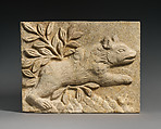 Wall panel with a charging bear, Stucco, Sasanian