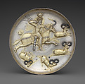 Plate with king hunting rams, Silver, mercury gilding, niello inlay, Sasanian