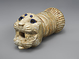 Ornament with heads of roaring lions, possibly the terminal of a sword or dagger hilt, Limestone, lapis lazuli, faience inlay, Assyrian