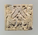 Furniture plaque carved in relief showing two winged, male figures flanking an infant on a lotus flower, Ivory, Assyrian