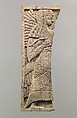 Furniture plaque carved in relief with standing woman, Ivory, Assyrian