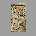 Plaque with griffin, Ivory, Assyrian