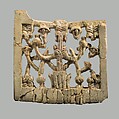 Openwork plaque with papyrus and pomegranates, Ivory, Assyrian
