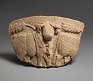 Fragment of a vessel with wheat stalks and a procession of bulls in relief, Limestone