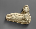 Plaque in the form of a reclining man, Ceramic, Parthian