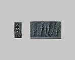 Cylinder seal and modern impression: combat between men and a lion, Black-grey hematite, Cypriot