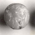 Stamp seal (grooved circular base with loop handle) with cultic scene
, Flawed neutral Chalcedony (Quartz), Assyro-Babylonian