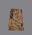 Plaque carved in relief with kneeling figure, Ivory, Assyrian