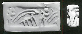 Cylinder seal with two-figure contest scene
, Faience, Iranian