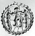 Openwork stamp seal: figure holding snakes, Copper alloy, Bactria-Margiana Archaeological Complex