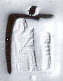 Stamp seal (tabloid with swivel wire handle) with deity (?)
, Copper/bronze, Urartian