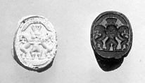 Scarab seal with Bes dominating two lions below a winged sun disc, Jasper, green