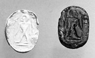 Stamp seal (scarab) with anthropomorphic figure
, Mottled green glass, Phoenician
