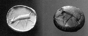 Stamp seal (scaraboid) with animal
, Banded and flawed orange Carnelian (Quartz), Assyro-Babylonian