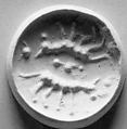 Drilled gabled lentoid seal, Steatite, light green